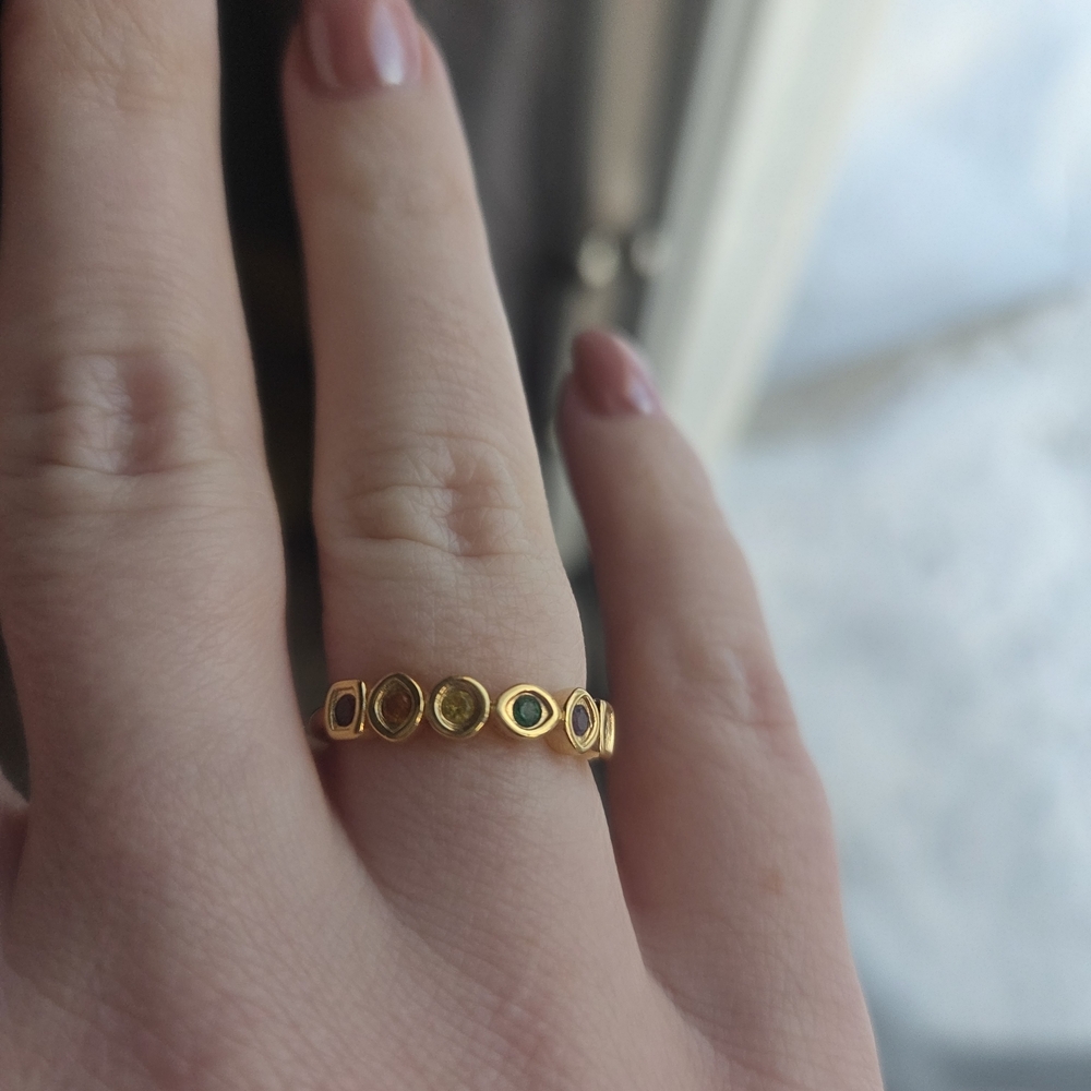 Elegant Gold-Toned Ring with Gem Accents